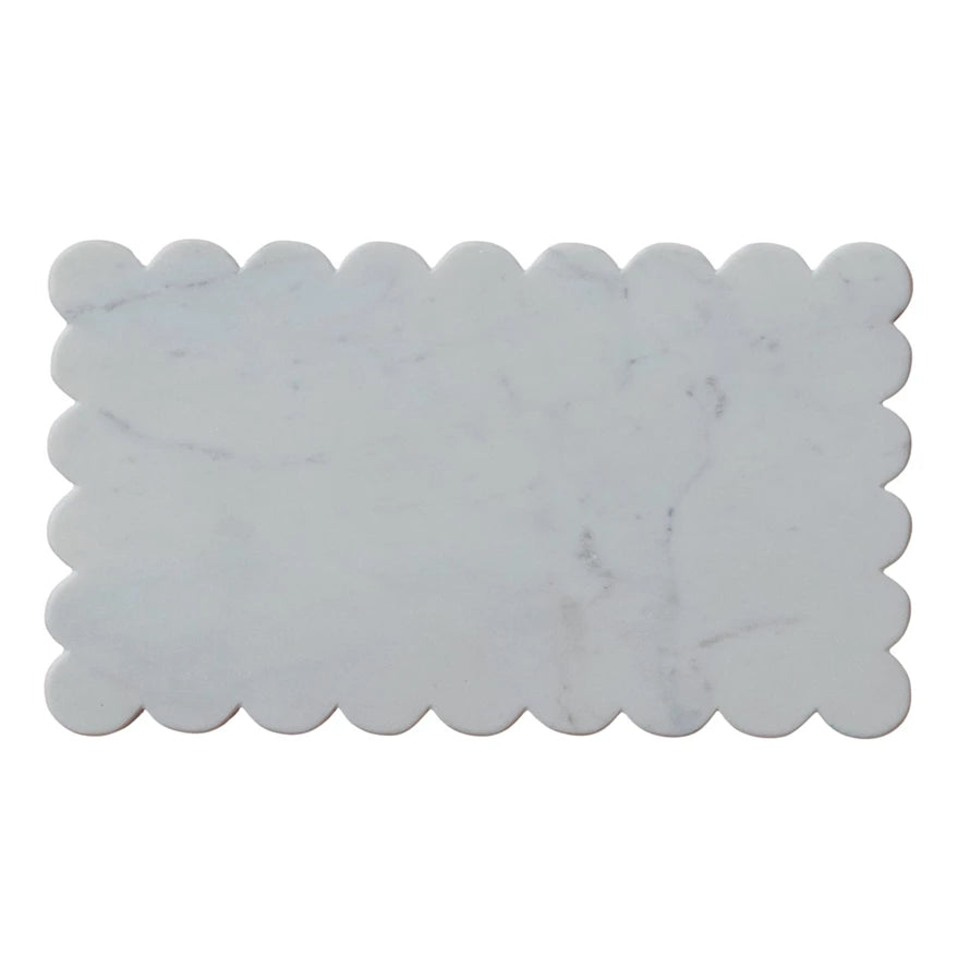 Marble cheese board with scalloped edges