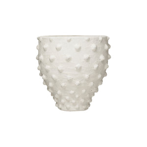 White pot with raised dots